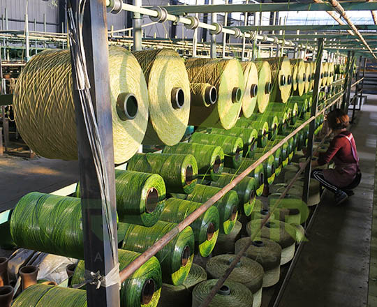 Twisting artificial grass yarn on Relyir production line