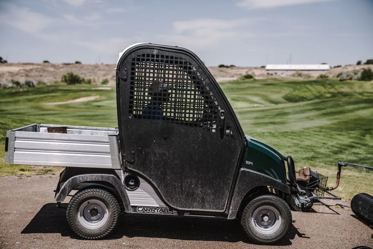 Utility vehicle parked at a sports facility
