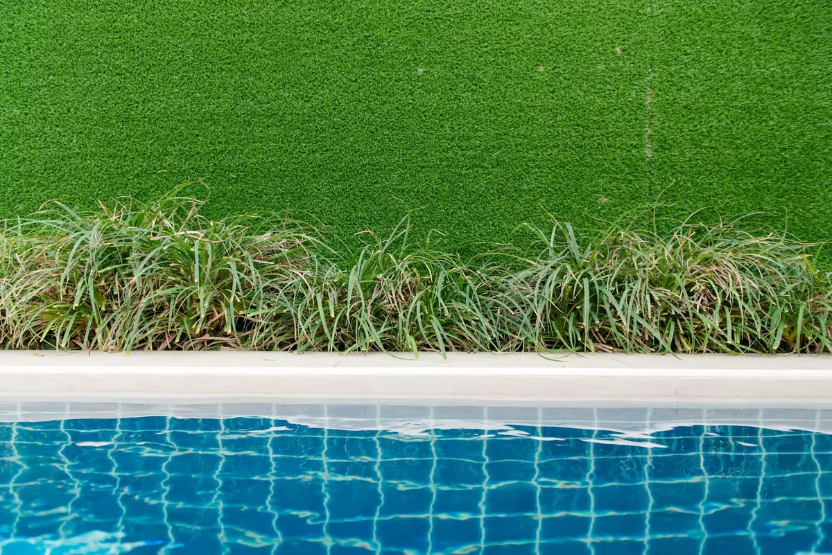 Artificial grass rolls staged for supply before installation