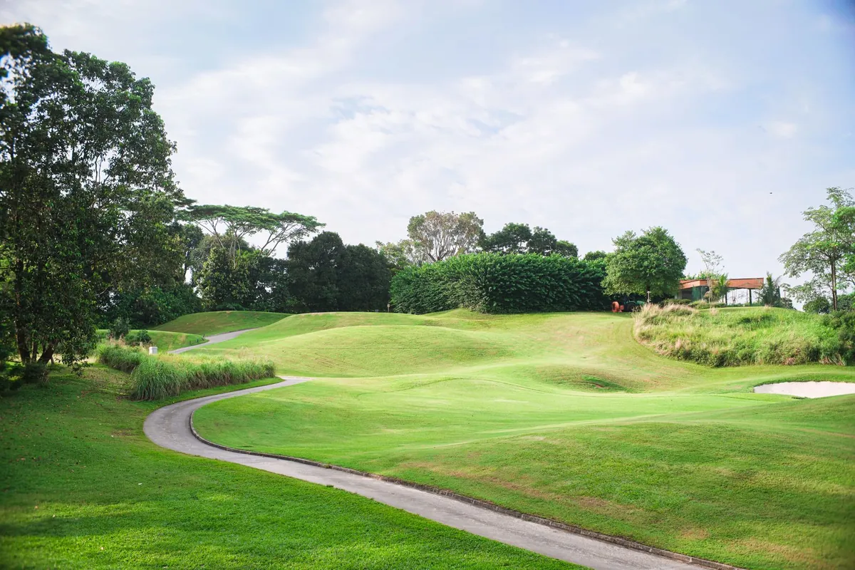 Manicured sports lawns under a clear sky