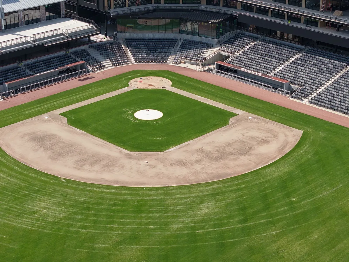Aerial view of an empty stadium infield showing the full diamond layout