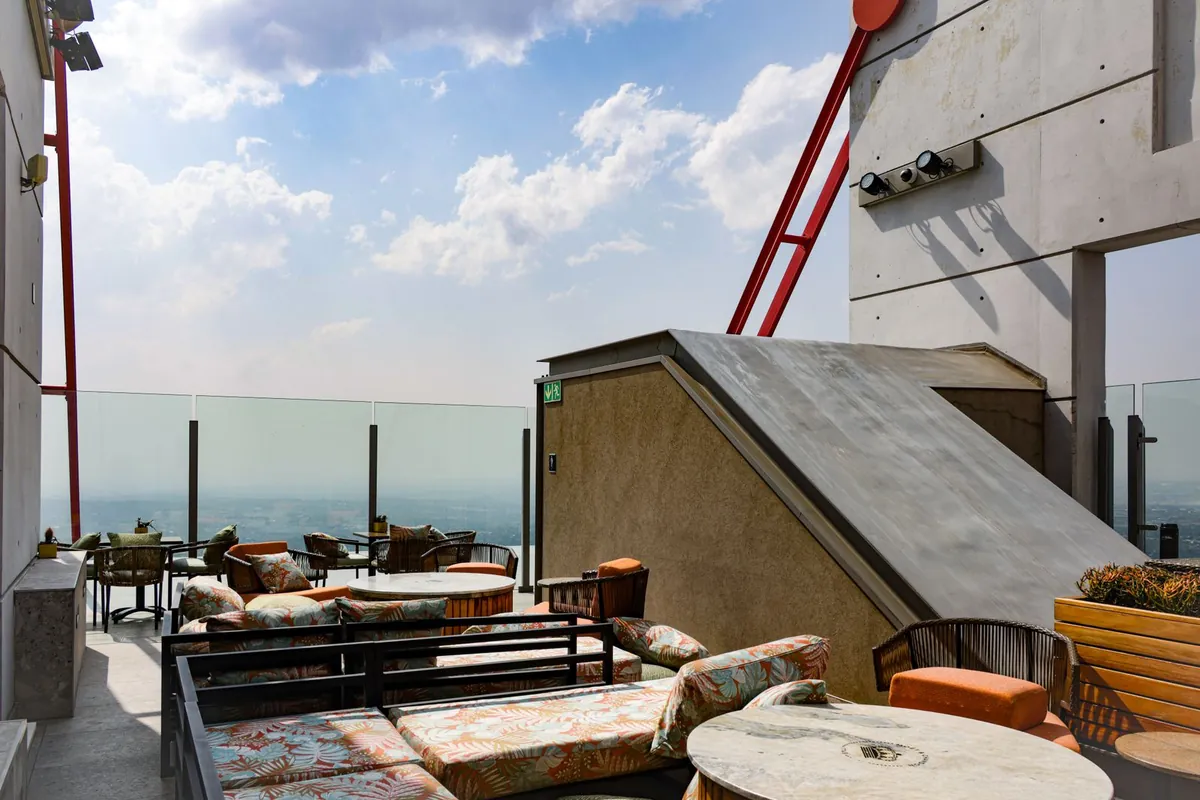 Rooftop terrace lounge finished with artificial grass