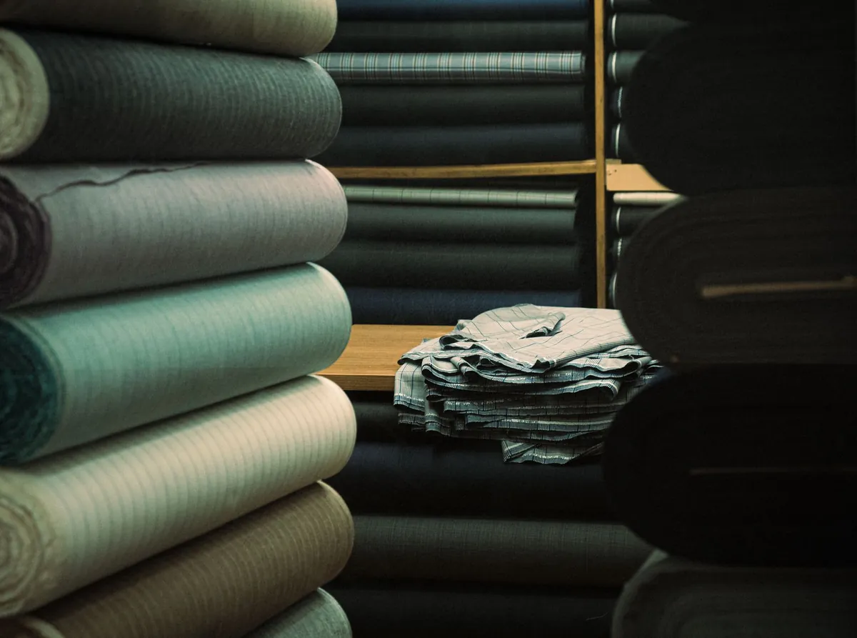 Rolls of material stacked in a warehouse before dispatch