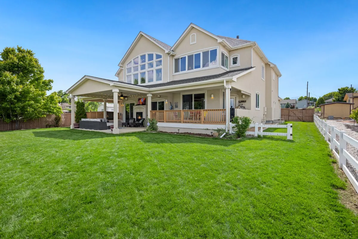 Green lawn beside a backyard patio outdoors